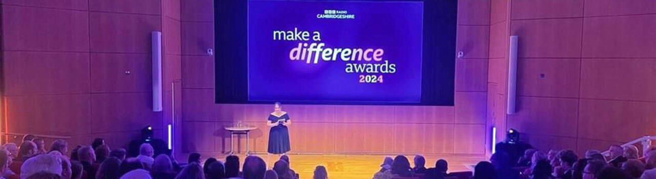 Presenter on stage for the BBC Make a Difference Awards.