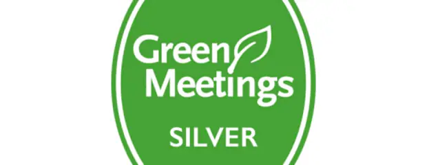 Oval green logo, with text: Green Meetings SILVER